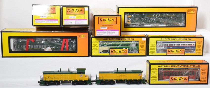 8 Railking locos, street cars and Doodlebugs: MTH Railking modern O gauge locos, street cars and Doodlebugs. Includes 30-2521-0 Chicago PCC street car, 30-2504-0 San Francisco PCC street car, 30-2512-0 Brill trolley, 30-2159-0 and 30-2159-3 Chica