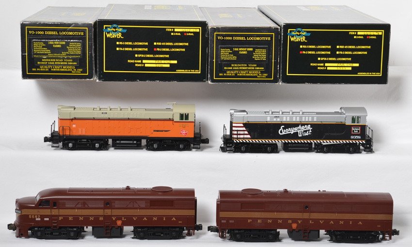 Weaver PRR FA-FB, Burlington and Milwaukee VO-1000: Weaver modern O gauge diesel locomotives in OBs. Includes three rail 5560 and 5557 Pennsylvania Alco FA and FB pair, 1560S Burlington VO-1000 two rail version without sound, and 1561LP Milwaukee Road 