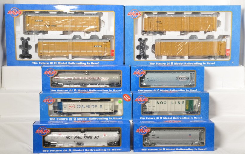 6 Atlas O articulated auto racks and freight cars: Atlas modern O gauge freight cars in OBs. Includes 6291-1 TTX articulated auto rack, 6295-2 Norfolk Southern articulated auto rack, 6408-2 ACF demo tank car, 6308-2 New York Central hopper, 8605 ACF d