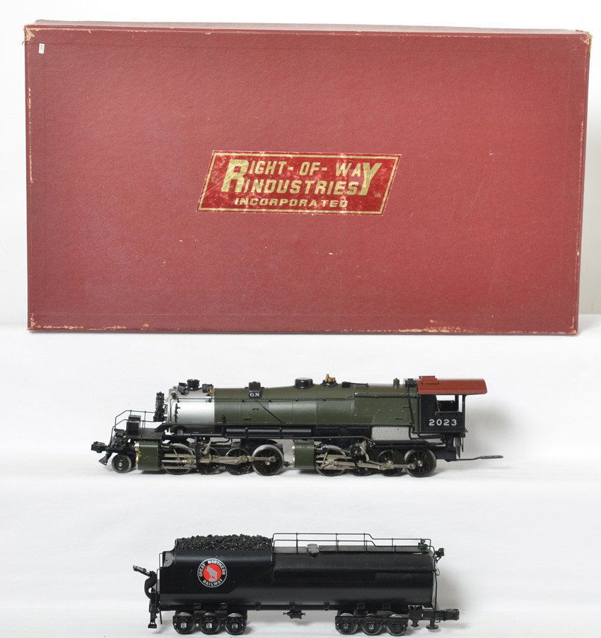 RIght of Way Great Northern N-3 2-8-8-0: Right of Way modern O gauge Great Northern N-3 2-8-8-0 steam locomotive in OB. Loco features brass construction, smoke, and sound. Loco is C7 area missing switch cover from top of boiler, some paint l