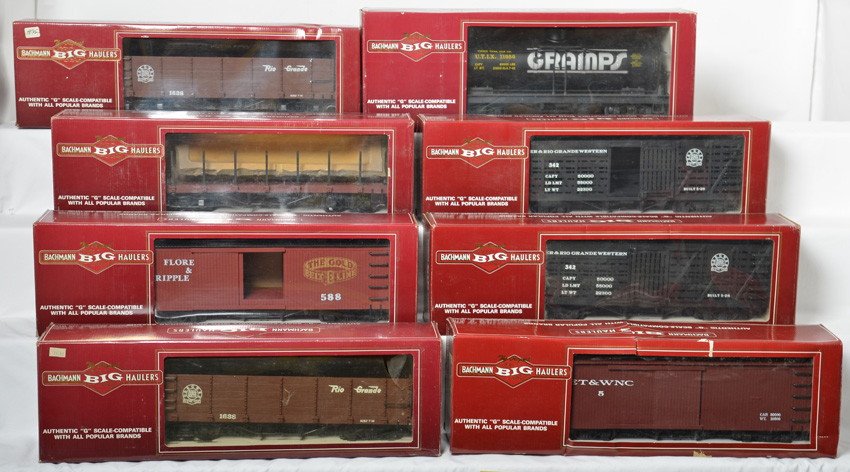 13 Bachmann loco and freight cars: Bachmann modern G scale locomotive and freight cars in OBs. Loco is a Colorado and Southern No.26. Loco is mostly disassembled but includes replacement parts C6-7. Twelve freight cars include 93445 Gr