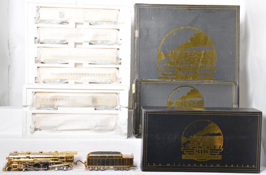 MTH gold plated Hudson and passenger cars: MTH modern O gauge 18K gold plated 20-3040-1 New York Central 4-6-4 J1e Hudson steam loco with Proto Sound and 20-4029 five car Madison passenger car set including three coaches, baggage and an observ