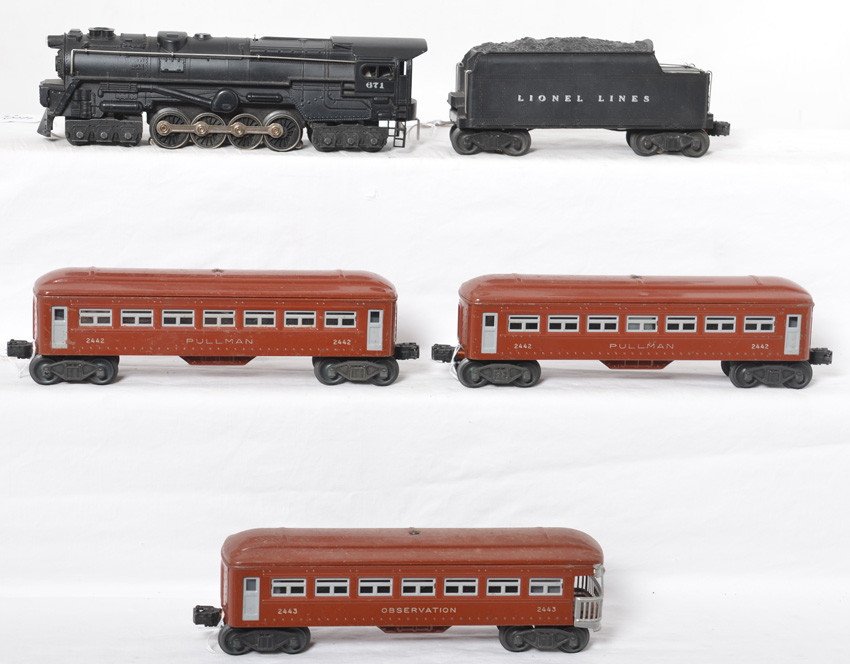 Lionel 671 steam loco, 671W tender, 2442 x2, 2443: Postwar Lionel O gauge 671 steam locomotive with 671W whistle tender, two 2442 Pullman coaches, and 2443 observation. Loco and tender look restored C7-8 with silver lettering, passenger cars look orig