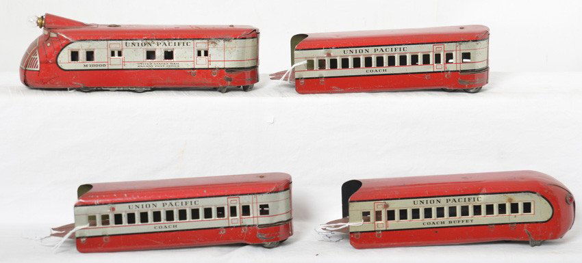Marx O gauge streamline diesel U.P. M-10000 passenger: Prewar Marx O gauge Union Pacific M-10000 articulated diesel passenger train with RPO powered unit, two coaches, and a coach buffet observation car. Trains have a little light surface rust/oxidation o