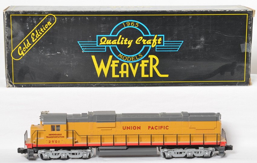Weaver Alco Union Pacific C-630 diesel locomotive: Weaver modern O gauge Union Pacific Alco C-630 diesel locomotive in OB. Loco features horn. C8 with run time and shelf dust. OB has corner and edge wear along with dust.