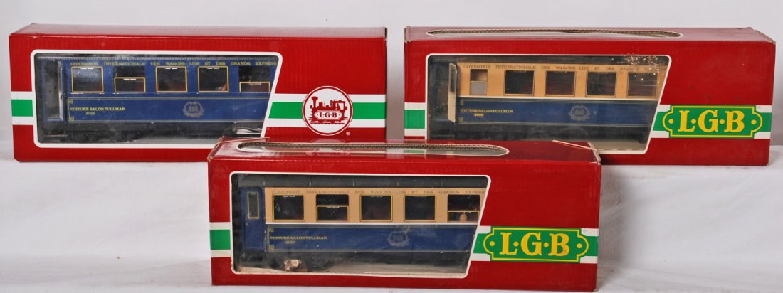 3 LGB passenger cars 3097 3098 34620: LGB modern G scale passenger cars in OBs. Three cars include 3097, 3098, and 34620. Cars are generally C6-7, one or two small missing detail parts, some light dirt and fading and broken window or two.