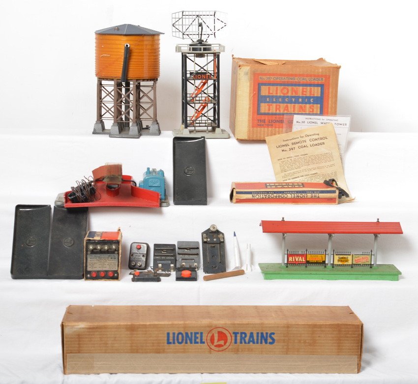 Lionel accessories, 110 in OB, 397 in OB, 30, 156,: Postwar Lionel O gauge accessories. 110 trestle set in OB, 397 coal loader in OB, 30 water tower, 156 illuminated station platform, 197 radar tower, 166 whistle controller in OB, and more. 30 has brok
