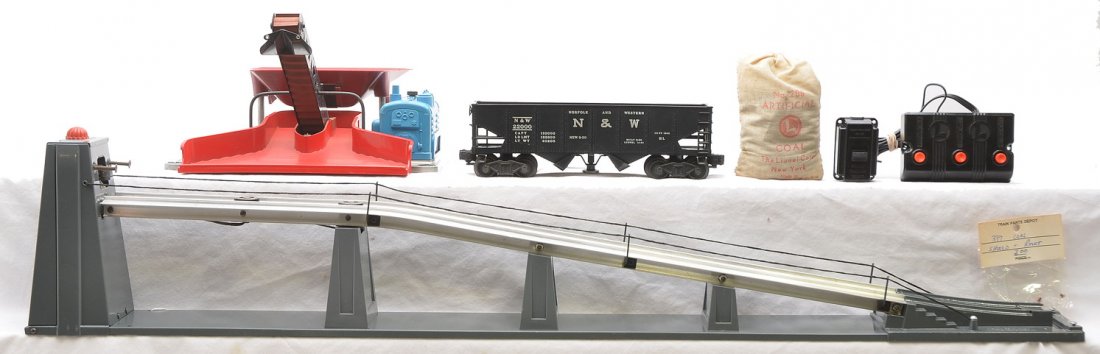 Lionel 456 Coal Ramp 397 Coal Loader: Lionel postwar 456 coal ramp with a 456C controller, 206 bag of coal, instruction sheet and 3456 black Norfolk & Western hopper. The coal ramp has been restored and restrung. The car is C7. Also inclu