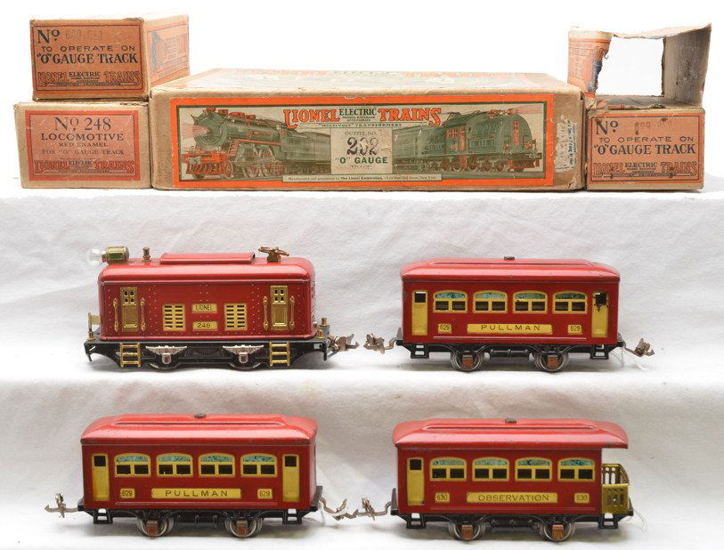 Lionel Red Passenger Set no. 292 248 2-629 630: Lionel prewar O gauge red passenger set no. 292 in individual boxes and set box containing; 248 electric 0-4-0 loco, two 629 Pullmans and a 630 observation. The cars have cream inserts and copper jour