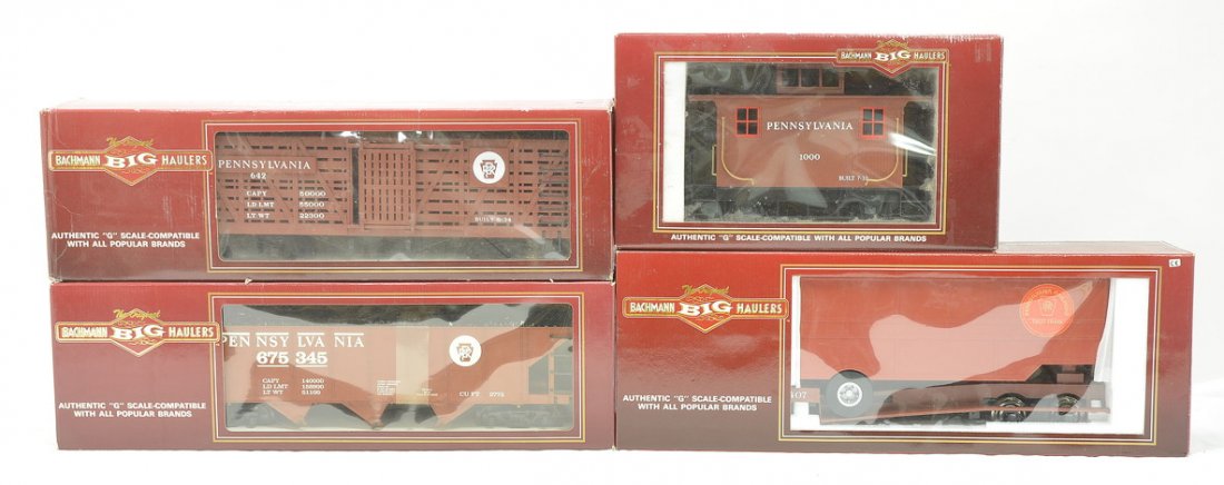 Bachmann Big Haulers Pennsylvania Freight Cars: Bachmann Big Haulers G scale Pennsylvania freight cars including; 98114 stock car, 98314 flatcar with closed trailer, a 98214 three bay hopper and a 93114 four-wheel caboose all in OBs, C9-10.