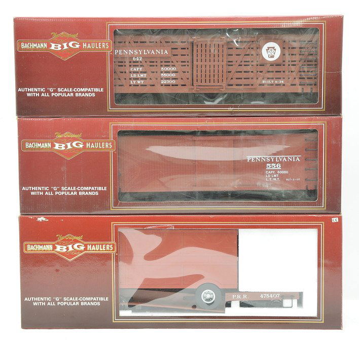 Bachmann Big Haulers Pennsylvania Freight Cars: Bachmann Big Haulers G scale Pennsylvania freight cars including; 98314 flatcar with closed trailer, 93314 wood boxcar with sliding door and a 98114 stock car all in OBs, C9-10.