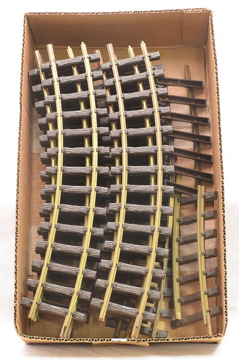 LGB 10-1500 Curve Track Sections Half Track: LGB G scale ten 1500 30-degree curve track sections and two 1500 half curve track sections. The track should clean to C8.