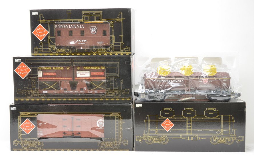 Aristo Craft 1 Ga PRR Tank Flat Reefer Cab MIB: Aristo Craft Trains 1 gauge 1/29 scale Pennsylvania freight cars; ART-41601 triple dome tank, ART-46513 piggyback flatcar with trailers, ART-46605 reefer and ART-42104 caboose all in OBs. Freight cars