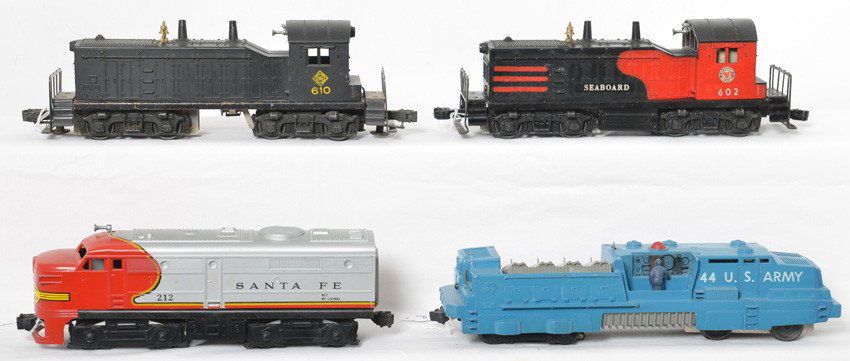 Lionel 44, 212, 602, 610 diesel locomotives: Postwar Lionel O gauge 44 U.S. Army missile launcher, 212 Santa Fe diesel Alco A unit, 602 Seaboard NW-2 diesel switcher, 610 Erie NW-2 diesel switcher. 44 has nicked shell, tiny touchups. 602 has spl