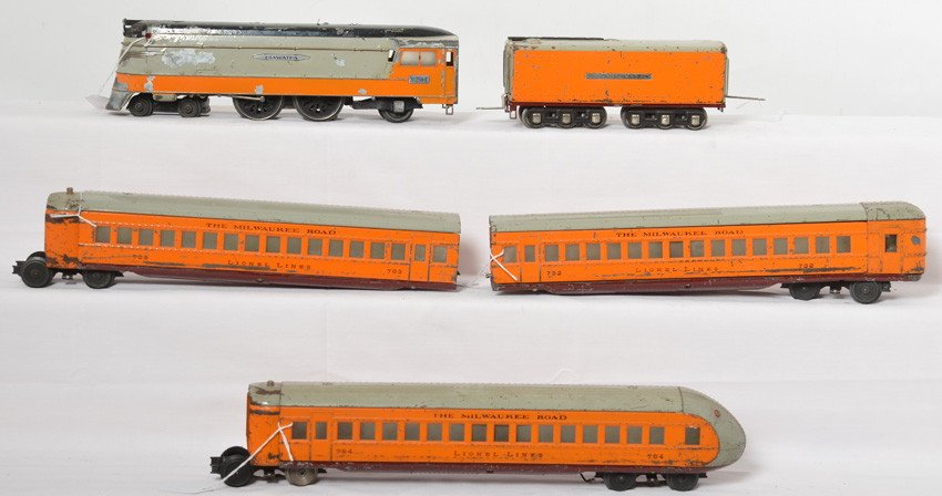 Lionel 250-E Hiawatha steam passenger train: Prewar Lionel O gauge No. 250-E Milwaukee Road Hiawatha steam locomotive with whistle tender, 782 combine, 783 coach, and 784 observation. 782 has very tight, mild casting fatigue. Loco has some flaki