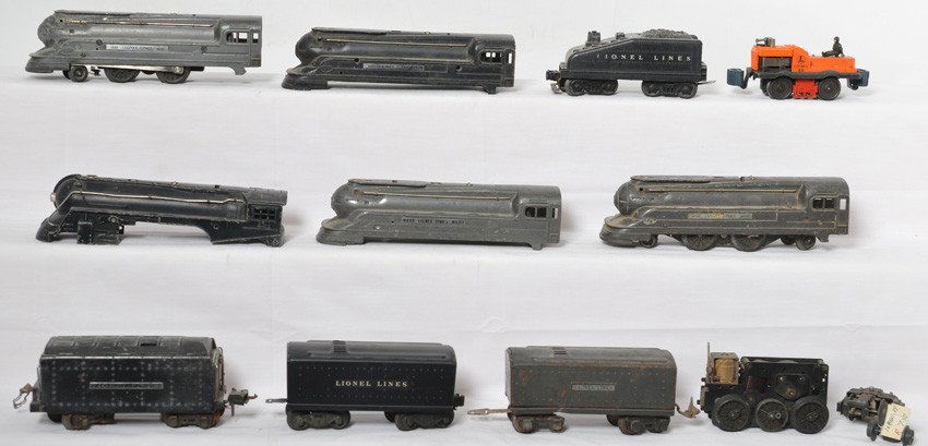Group of prewar and postwar Lionel trains, parts/repair: Prewar and postwar Lionel O gauge steam locomotives, tenders, and gang car. 50, 1688E, 1688, 1688, 1668E, 221, 1689T, unnumbered slopeback tender w/o backup light, 1654T, 2265W whistle tender. Trains