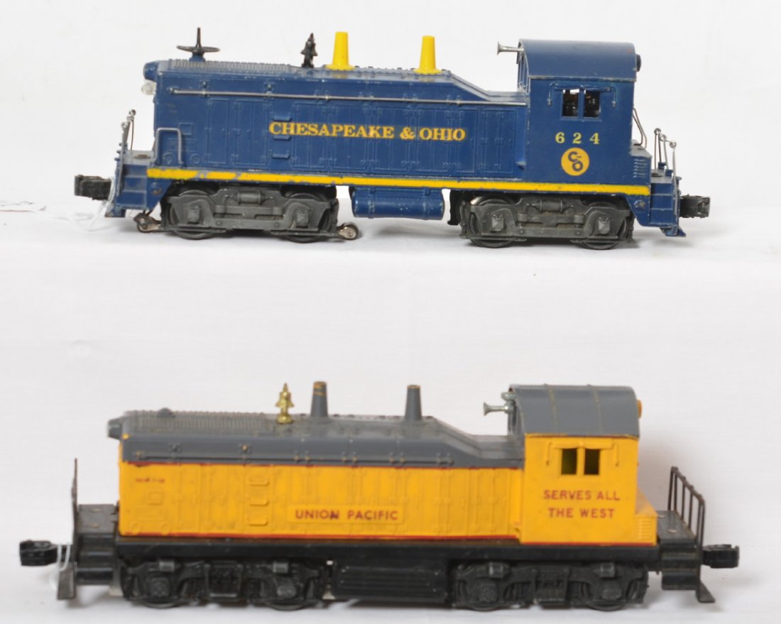 Lionel 624 C&O and 613 Union Pacific switchers: Lionel Postwar O gauge 624 Chesapeake and Ohio NW-2 switcher and 613 Union Pacific NW-2 switcher. Both are C6+ with paint wear, but no major cracks, or issues with shells.