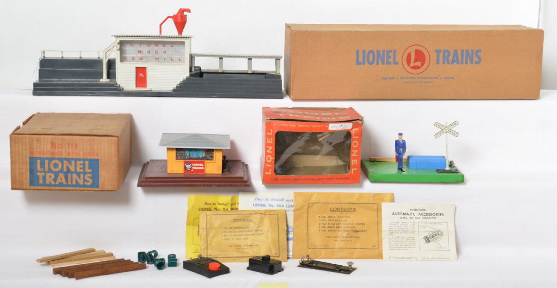 Lionel 114, 464, and 1047 accessories in OB: Postwar Lionel O gauge 114 newsstand with horn, with components in envelope; 464 lumber mill with components in envelope; and 1047 switchman with flag in cellophane window front box with instructions