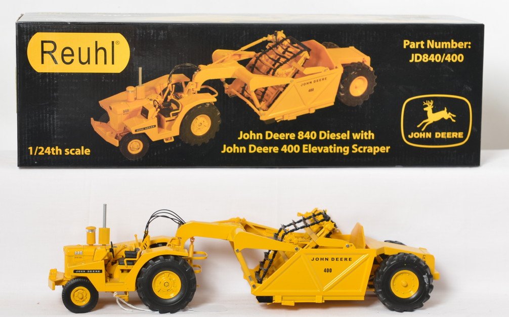 Reuhl John Deere 840 diesel with 400 elev. scraper in: Reuhl John Deere 840 Diesel with John Deere 400 Elevating Scraper in original box, 1/24th scale Part Number JD840/400, C9-10. Box shows little shelf wear.