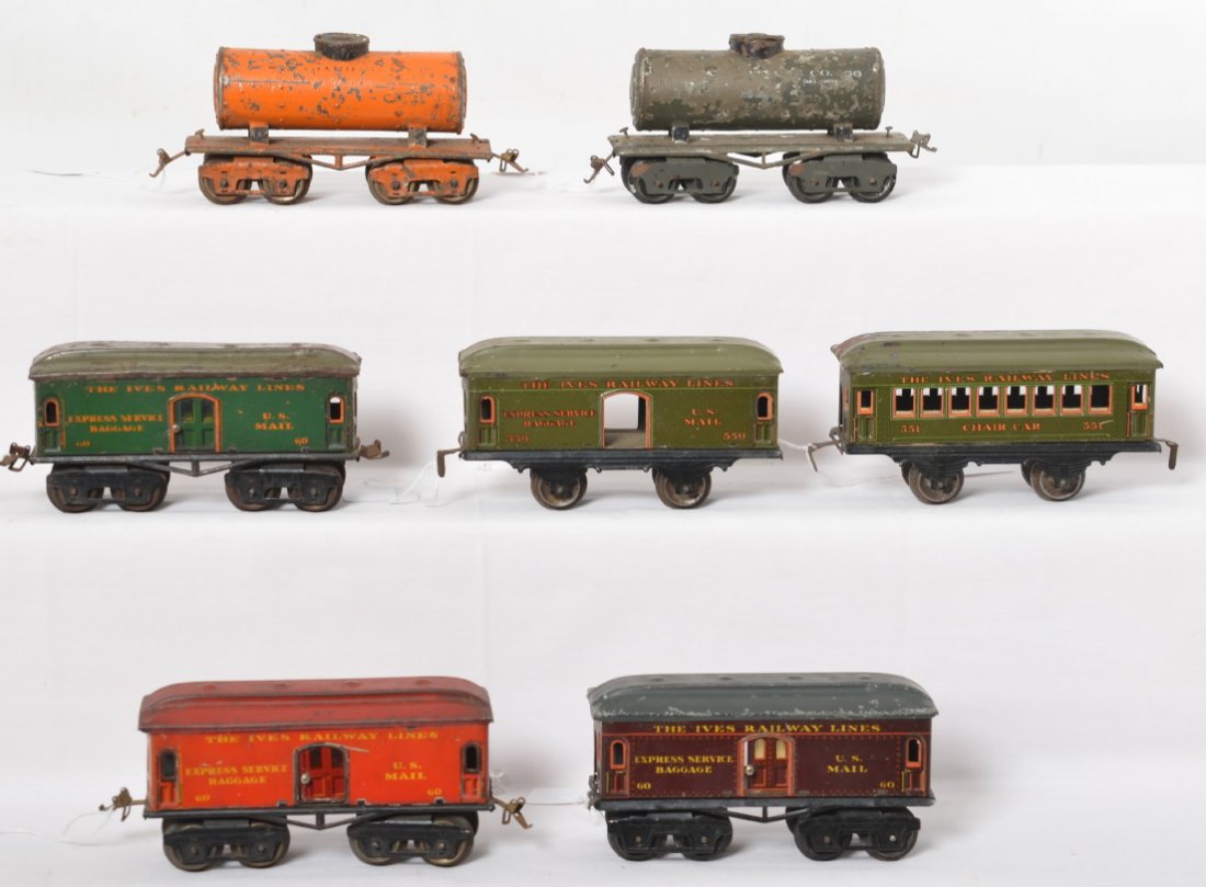 Ives 36, 60, 60, 60, 66, 550, 551 freight and passenger: Prewar Ives O gauge freight and passenger cars, C6 area. 36 and 66 Standard Oil tanks, three variations of 60 baggage/U.S. Mail, 550 baggage/U.S. Mail, and 551 Chair Car. Three missing couplers.