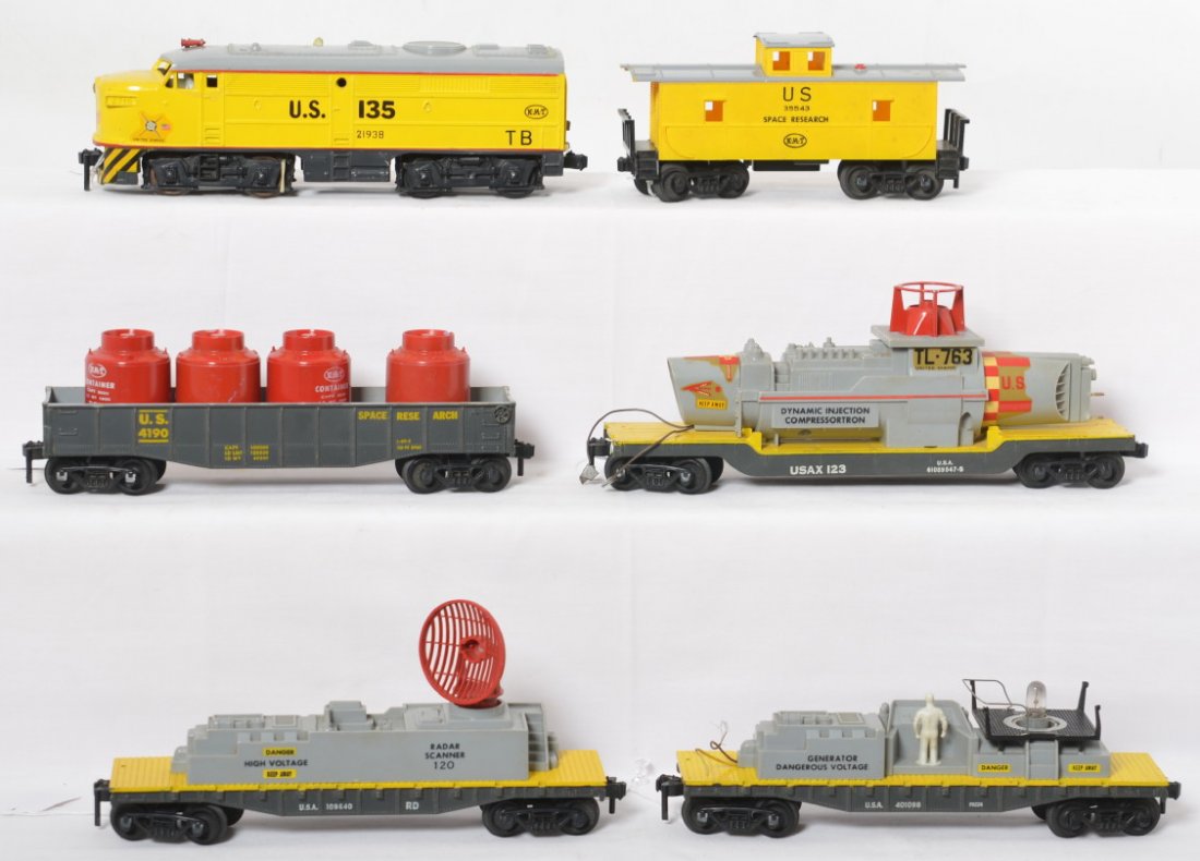KMT U.S. 2716 diesel, five Space Research freight: Postwar KMT O gauge United States Space Research diesel freight train with 2716 Alco diesel A unit (cracked front truck mount and needs rewired), 4190 U.S.S.R. gondola with four KMT containers (one ch