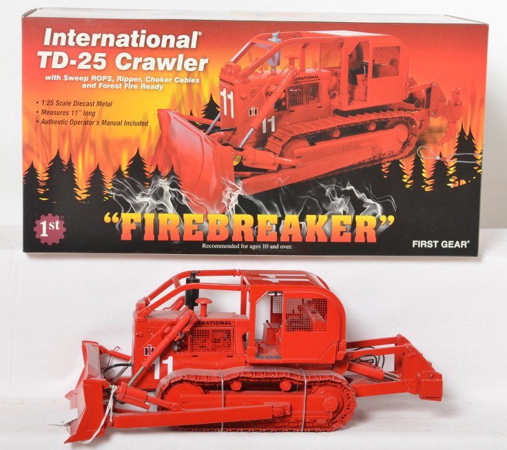 First Gear 40-0129 I.H. TD-25 FireBreaker crawler in OB: First Gear 40-0129 International TD-25 Crawler Firebreaker with Sweep ROPS, Ripper, Choker Cables, and Forest Fire Ready, 1:25 scale diecast toy in original box, C9-10. Box shows little wear.