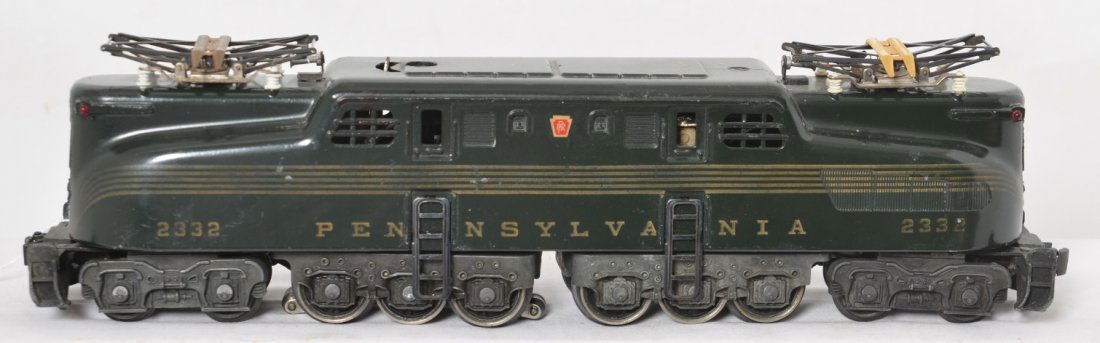 Lionel 2332 Pennsylvania 5-stripe GG-1 electric: Postwar Lionel O gauge 2332 Pennsylvania 5-stripe GG-1 electric locomotive, small touchups to green. Loco has Very Strong stripes, not perfect but super nice. Loco looks C6-7 area.
