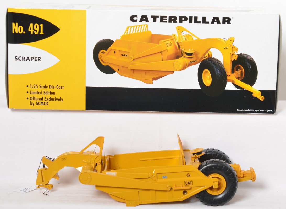 First Gear 49-0175 Cat No. 491 Scraper in OB: First Gear 49-0175 Caterpillar CAT No. 491 Scraper, 1:25 scale diecast toy in original box, displayed C9-10. Box shows little wear.