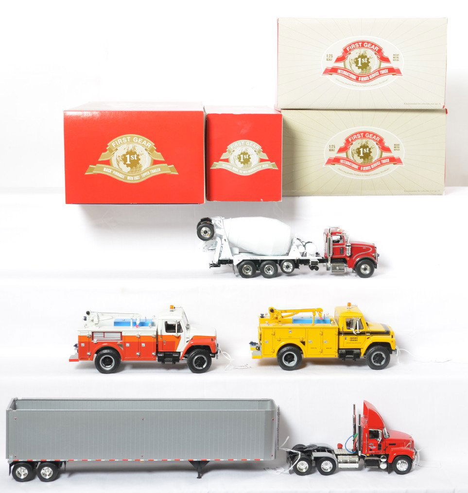 Four First Gear diecast construction trucks in OB: Four First Gear diecast construction toy trucks in original boxes, some have loose trim in box, displayed C8-9. 10-3812 Peterbilt Model 367 with Bridgemaster Mixer 1:34 scale, 10-3742 Mack Pinnacle wi