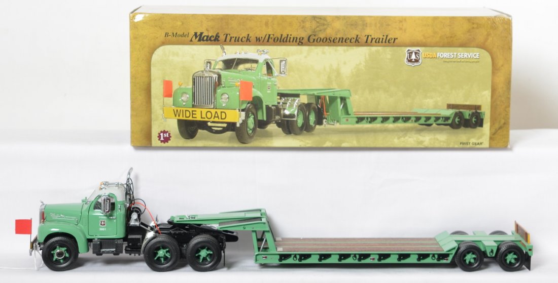 First Gear 49-0028 B-Model Mack Truck w/Folding Trailer: First Gear 1:25th scale diecast 49-0028 U.S. Forestry Service, Dept. of Ag. B-Model Mack Truck with Folding Gooseneck Trailer in original box, displayed C9-10. Box has lightly dinged corner, otherwise