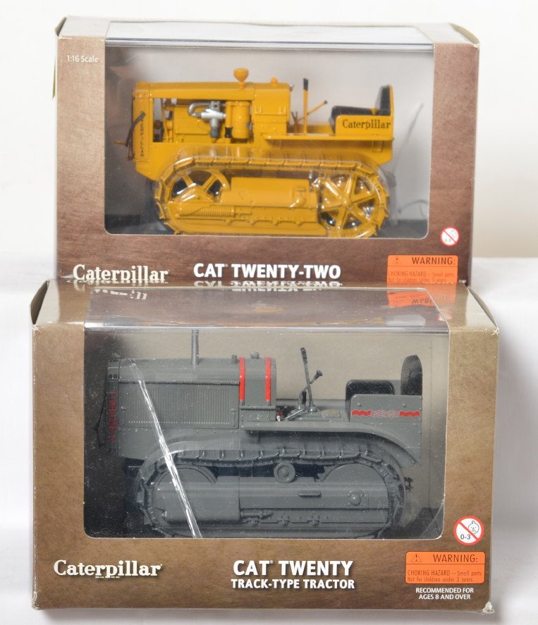 Norscot 55154 and 55201 Caterpillar tractors in OB: Two Norscot 1:16th scale diecast track type tractors in original boxes, C9-10. Boxes show little to light wear. 55201 CAT Twenty and 55154 CAT Twenty-Two.