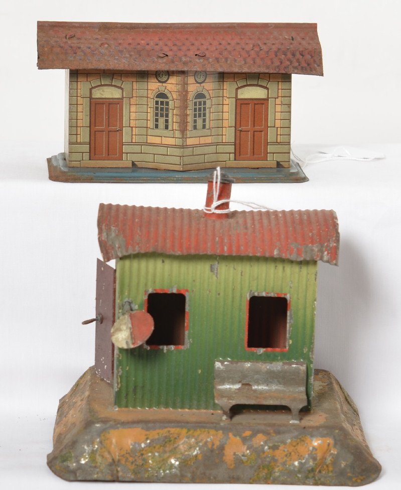 Two earlier European O ga. stations/buildings: Two early prewar? Bing? or other European manufacturer(s), O gauge stations C6 area. Larger station is marked Germany on underside, measures approximately 157mm tall to chimney, other measures approxi