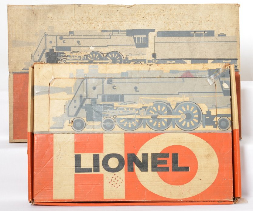 Lionel 5753 and 14260 HO train sets in OB: Postwar Lionel HO gauge 14260 5 unit diesel freight complete an ready to run, C7-8 with oxidation on plastic and track rails, box is square and complete with light wear, dirt/darkened. Original paper