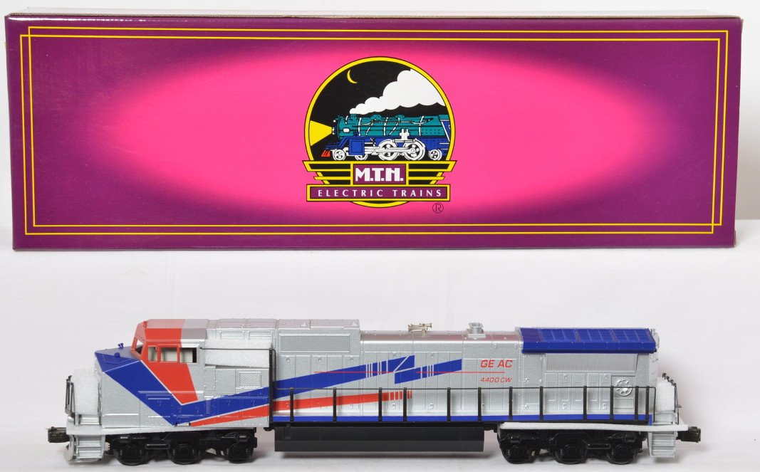 MTH GE Dash-9 demo with Proto: MTH modern O gauge 20-2160-1 GE Dash 9 demonstrator in OB. Loco features Protosound, Protocouplers, and much more. Loco is C7-8 with moderate run time and no windshields.