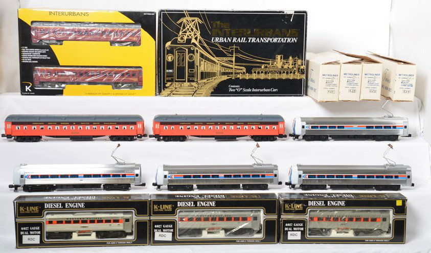 E Welz Metroliner set, K Line interurban cars, etc: Modern O gauge passenger items including E. Weltz electric trains Amtrak four car Metroliner set in C8 condition, K Line K-1934 Zephyrette three car set, South Shore K Line interurban two car set, and