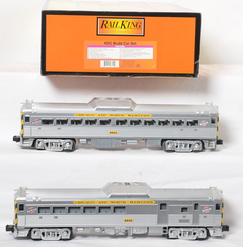 Railking C&NW Budd car set with Proto 2: MTH Railking modern O gauge 30-2390-1 Chicago and Northwestern Budd car set in OB. Loco features Protosound 2.0, DCS control, Protocouplers, and more. C8+ with light run time and shelf dust.