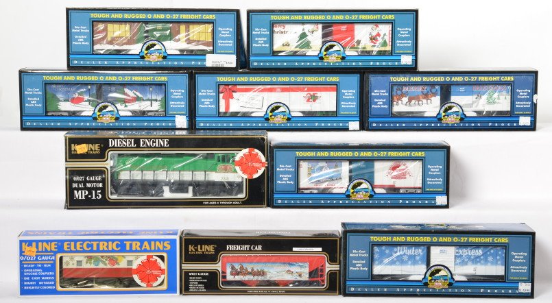 Railking and K Line Christmas cars and loco: MTH and K Line modern O gauge Christmas items in OBs. Railking items include 80005E, 80006F, 80004G, 80006E, 80006I, 80007G, 80003E. K Line items include K-2240 MP-15 powered switcher, 621-5602 Anheus