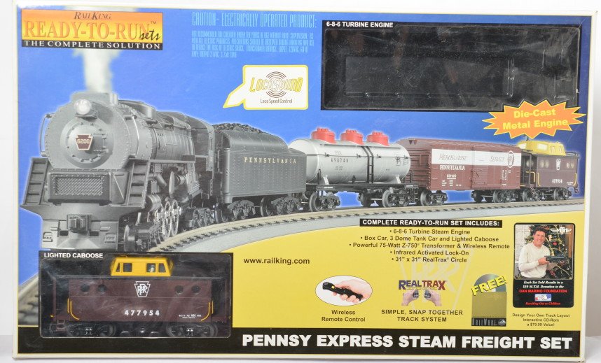 Partial Railking Pennsylvania set: MTH Railking modern O gauge partial Pennsylvania ready to run set. No loco. Included is three freight cars, remote, powerpack, and track. C8, sold as is.