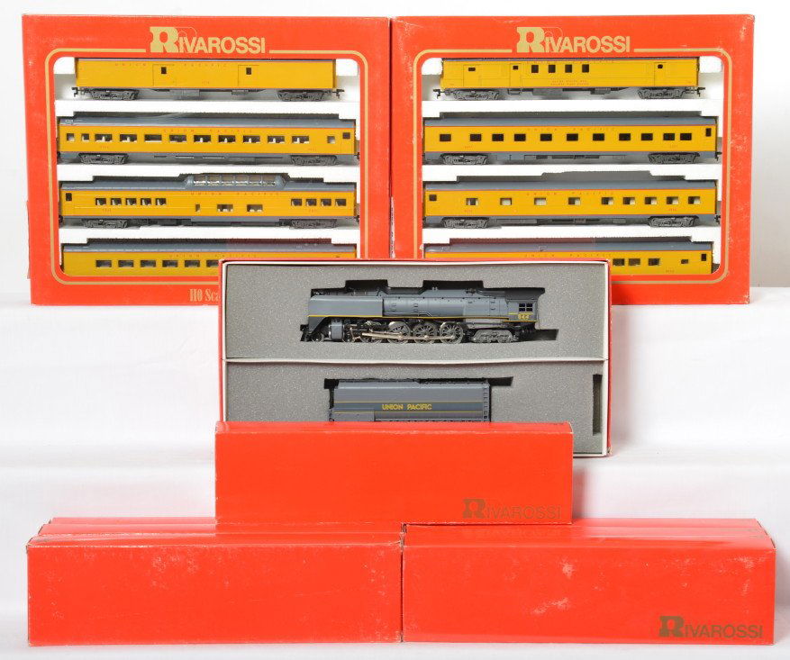 Rivarossi HO Union Pacific 844 and 15 passenger cars: Rivarossi modern HO trains in OBs. Includes 1587 Union Pacific 4-8-4 FEF steam locomotive. Fifteen passenger cars include 6964 and 6965 four car sets, 6718 baggage, 6719 coach, 6720 coach, 6721 roomet