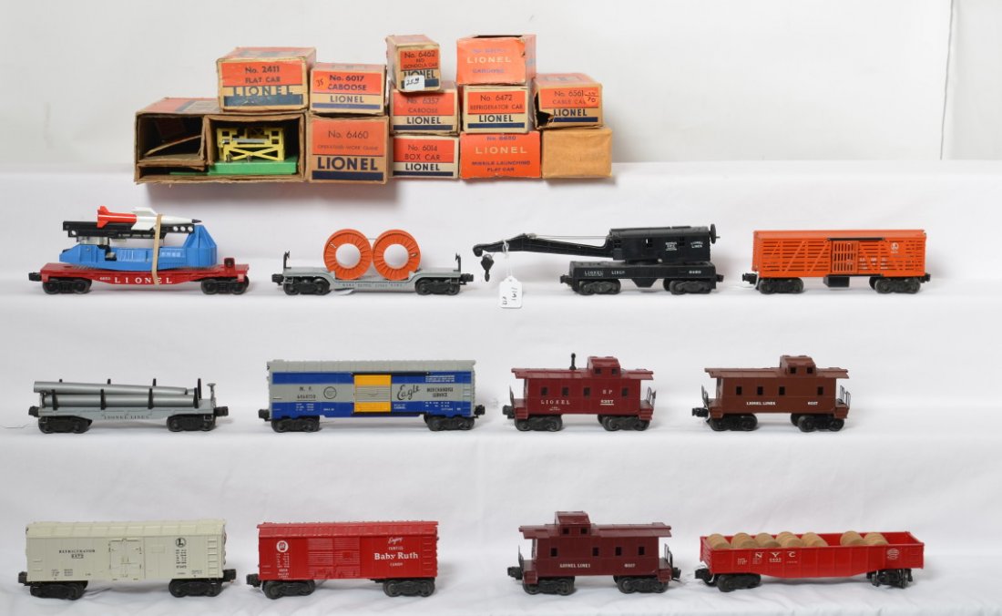 Lionel 2411, 6017, 6650, 6462, 6460, 3656, etc: Lionel Postwar O gauge freight cars in OBs. Includes 6464-150 Missouri Pacific boxcar, 2411 Lionel Lines flat, 6017 Lionel Lines caboose, 6017-1 Lionel Lines caboose box missing perf, 6462 New York Ce