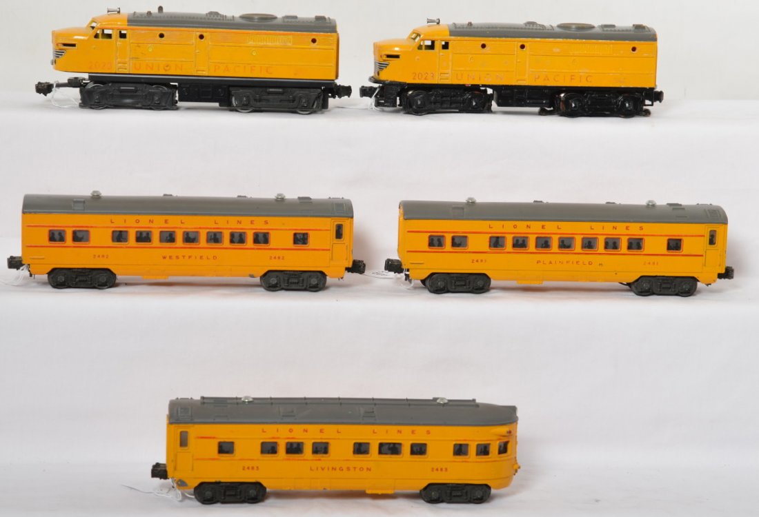 Lionel 2023 UP, 2481, 2482, 2483 yellow passenger train: Postwar Lionel O gauge 2023 Union Pacific Alco diesel A units, 2481 Plainfield Pullman, 2482 Westfield Pullman, and 2483 Livingston observation. Powered unit has slot added in roof for lever, and miss