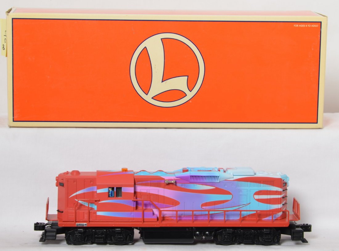 Lionel 18881 Custom GP-9 II: Lionel modern O gauge 18881 Hot Rod GP-9 custom II locomotive in OB. Loco features TMCC, Railsounds, Electrocouplers, and much more. Loco is C8 with run time. OB has some light corner wear.