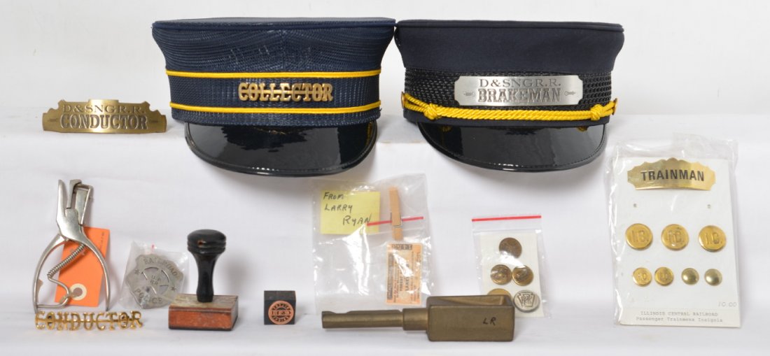 Lot of conductors hats, buttons, and more: Lot of conductors items. Includes two conductor hats, ticket punch, Illinois Central button set, Pennsylvania and CRP&L buttons, Union Pacific police badge, C&EI Silent Night stamp, and what appears t