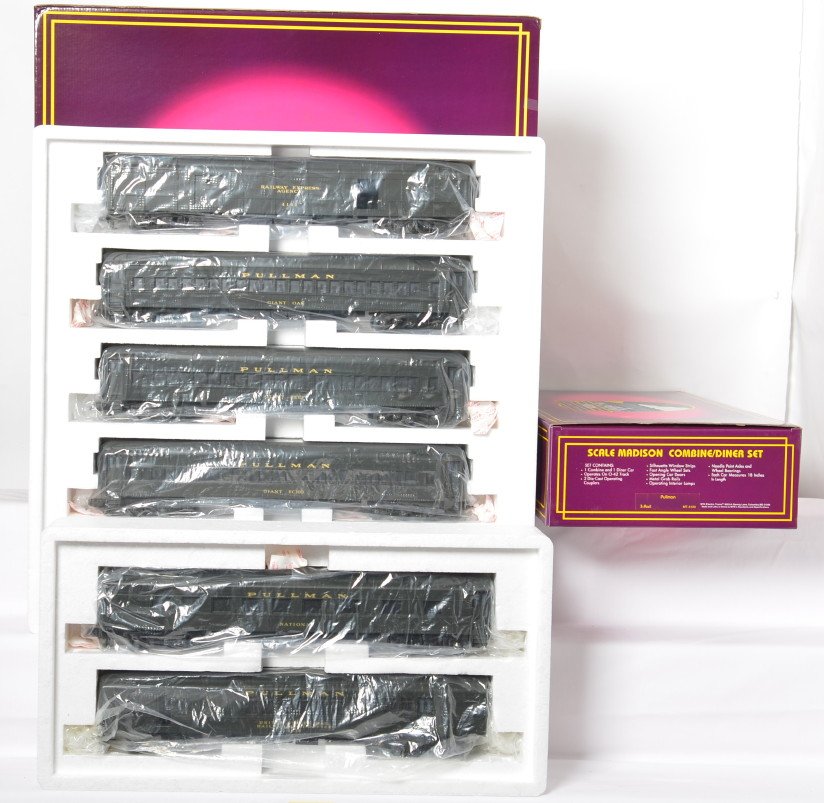MTH Pullman Madison 7 car passenger set: MTH modern O gauge Pullman Madison seven car set in OBs. Includes MT-4020 five car set and 4120 two car add on set. Cars are C8 with run time.