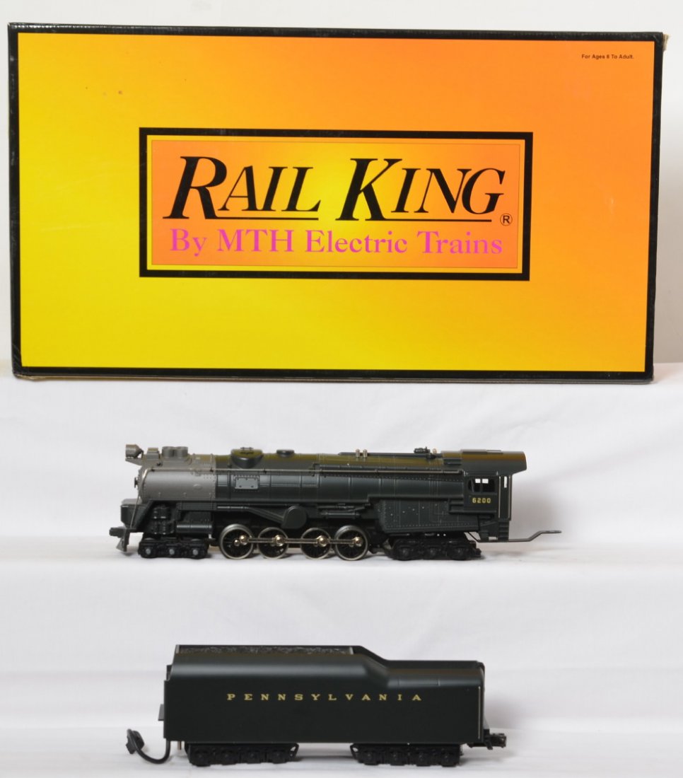 Railking Pennsylvania S-2 turbine with Proto: MTH Railking modern O gauge 30-1149-1 Pennsylvania S-2 turbine steam locomotive in OB. Loco features Protosound, Protosmoke, Protocoupler, and more. Loco is C8 with run time. OB has some light corner 