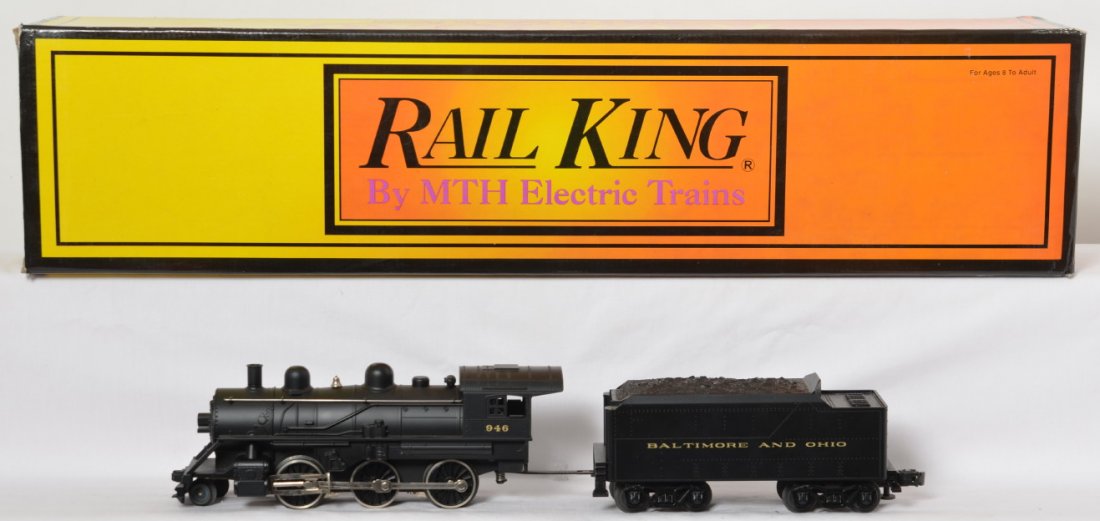 Railking B&O 2-6-0 with whistle: MTH Railking modern O gauge 30-1137-0 Baltimore and Ohio 2-6-0 steam locomotive with whistle and smoke. C8 with run time. Box has light wear.