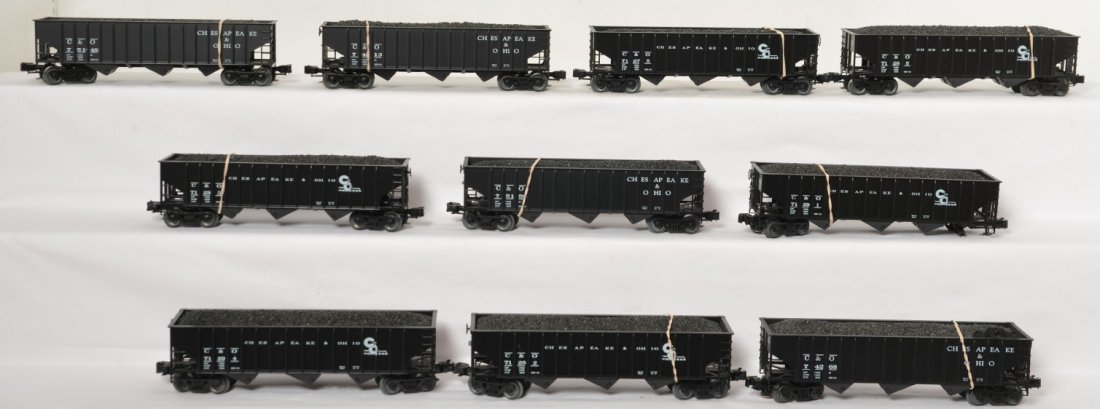 11 Weaver C&O coal hoppers: Weaver modern O gauge Chesapeake and Ohio coal hoppers. All individually numbers and in C8 condition. One loose wheel set. No boxes.