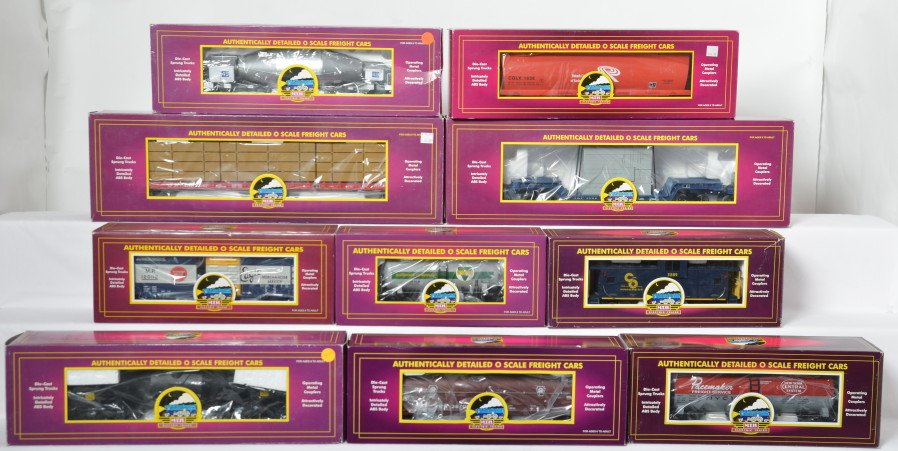 10 MTH freight cars 98234, 98202, 97474, 98109,: MTH Premier modern O gauge freight cars in OB. Ten freight cars include 98234 CP Rail flat with lumber, 9202L New York Central tank car, 9102L Chesapeake and Ohio caboose, 93008 Missouri Pacific boxca