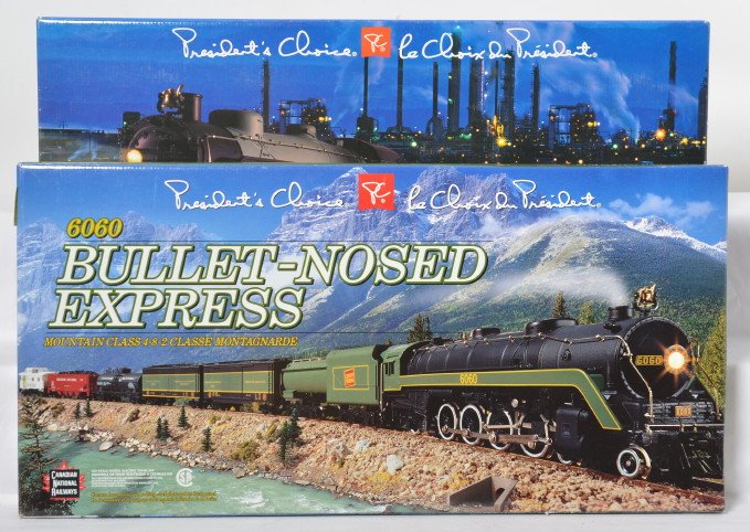 2 Presidents Choice Canadian HO sets: Presidents Choice modern HO Canadian train sets in OBs. Includes 6060 Canadian National Bullet Nose Express and Canadian Pacific 4-6-2 Pacific Express. Sets are C9-10.