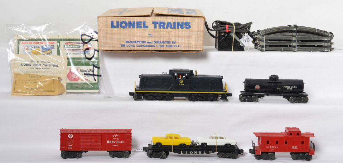 Boxed Lionel 701 628 NP GE 44T diesel freight set: Postwar Lionel O gauge No. 701 diesel freight set in original box. Set is comprised of the following trains; 628 Northern Pacific GE 44 ton diesel switcher locomotive, X6014 PRR Baby Ruth boxcar, 6025